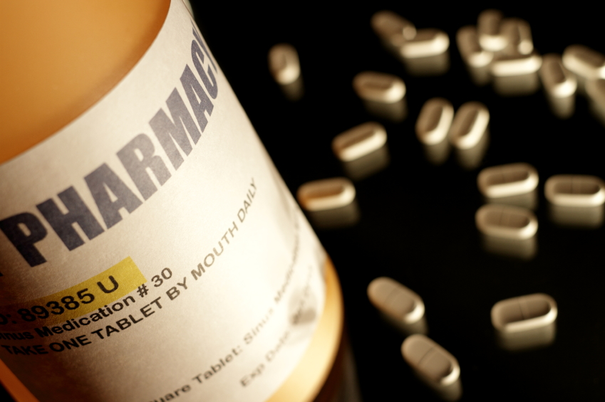 Prescription Drug Bottle With White Pills